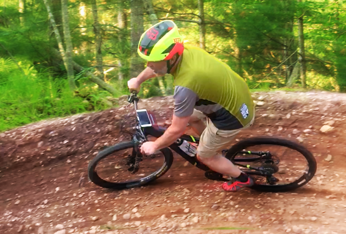 Riding a berm at the Zip Trail